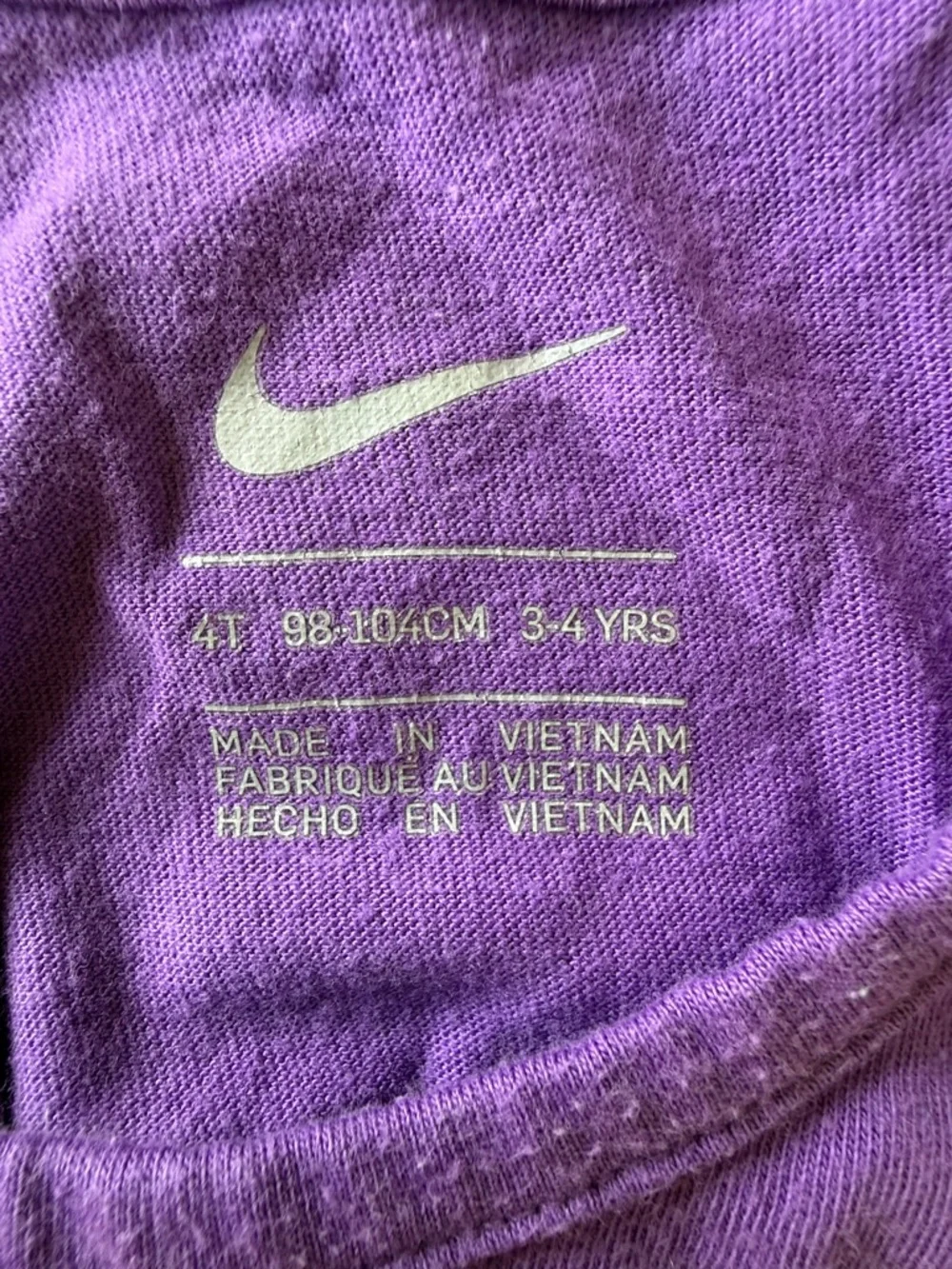 Nike Purple Graphic Tank with Black Shorts and Multicolor Patterned Bike Shorts - Picture 4 of 7